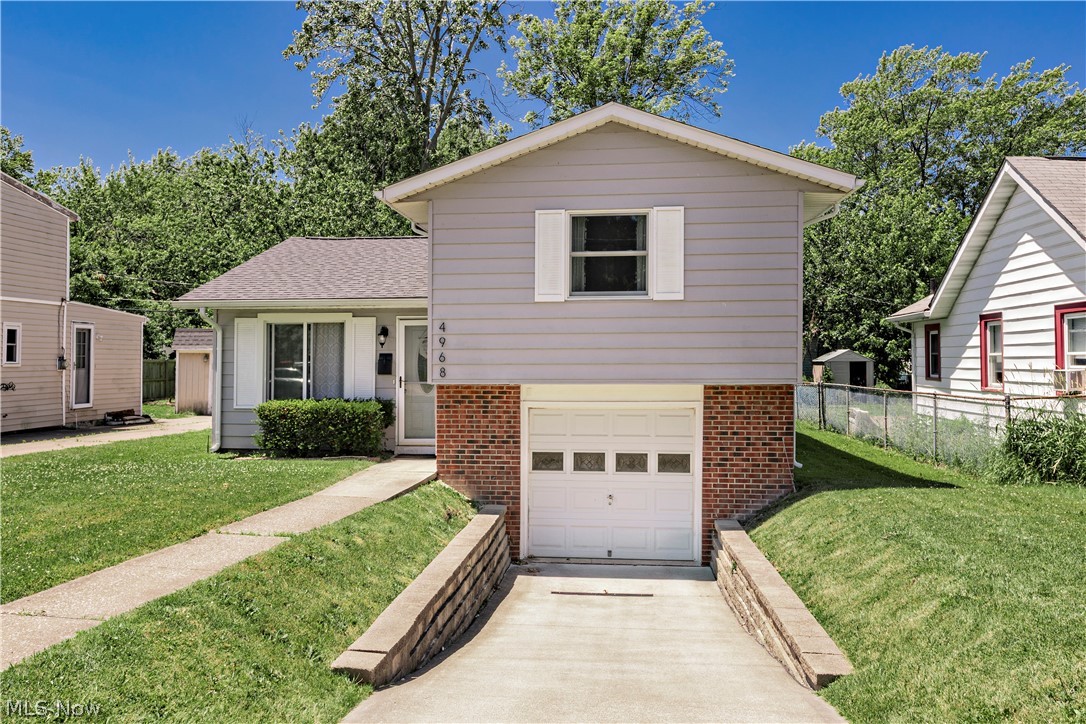 Welcome to this charming Mentor home offering comfortable living and great updates throughout. This 3-bedroom, 1-bath split-level features a spacious family room, an updated eat-in kitchen with white cabinetry, solid surface countertops, and stainless-steel appliances. The inviting sunroom provides the perfect space to relax year-round. Outside, enjoy a fenced backyard complete with a storage shed and plenty of room for outdoor activities. Conveniently located near shopping, dining, parks, and Lake Erie amenities. Move-in ready and waiting for its next owner!
