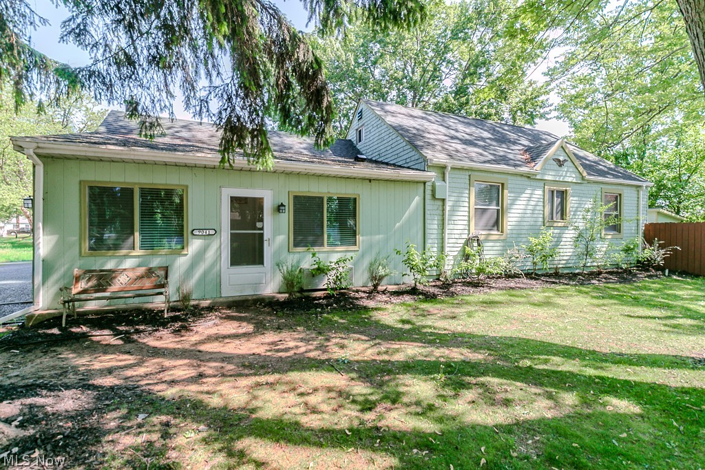 Charming 4+ Bedroom Cape Cod on a Corner Lot in Mentor! This inviting home welcomes you through a cozy enclosed breezeway and into a warm, character-filled living room featuring beautiful wood beams and a stunning stone fireplace that can be enjoyed as either gas or wood-burning. The open-concept flow from the living room to the dining area and updated kitchen creates the perfect space for entertaining family and friends. The kitchen comes complete with appliances, granite countertops and offers both style and functionality.

The first floor features three spacious bedrooms (one currently used as a home office) and two updated full bathrooms, providing convenience and flexibility. Upstairs, you’ll find a large dormer bedroom offering additional space and privacy.

The finished lower level adds even more versatility with an additional living area ideal for a guest room, office, or flex space.

Step outside to enjoy the gorgeous fenced backyard, complete with a huge deck perfect for entertaining, raised planters ideal for gardening, a storage shed and plenty of outdoor space to relax. Additional updates include replaced and freshly painted siding, adding to the home’s curb appeal. Conveniently located close to all amenities, this home is move-in ready and full of charm!