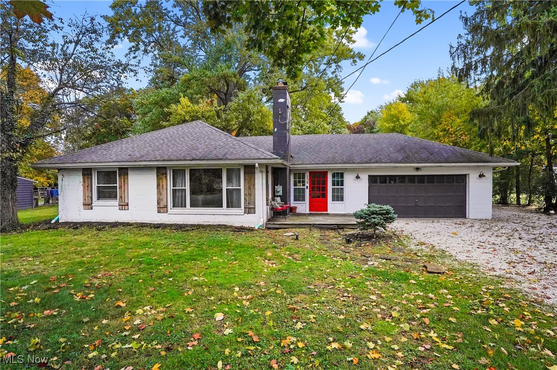 Welcome to this beautifully updated ranch in the heart of Tallmadge! As you step into the foyer you are greeted with an abundance of natural light and an open floor plan. The living room offers large windows to allow for even more natural light and carpet to keep you cozy. In the dining room you will find it is connected to the kitchen with real hardwood floor. The kitchen has been tastefully updated from head to toe. 2 large bedrooms and a full bathroom finish the first floor. In the basement you will find laundry, storage space, another full bathroom, a living room and a third bedroom. In the 2 car garage there is a gas heater that will stay with the home. This home sits on just over an acre of land with a chicken coop! Some updates include- basement waterproofing, new gravel in the driveway, fresh paint, etc. Schedule a showing to see what this house has to offer before it's gone! A detailed list of updates is in the supplements.