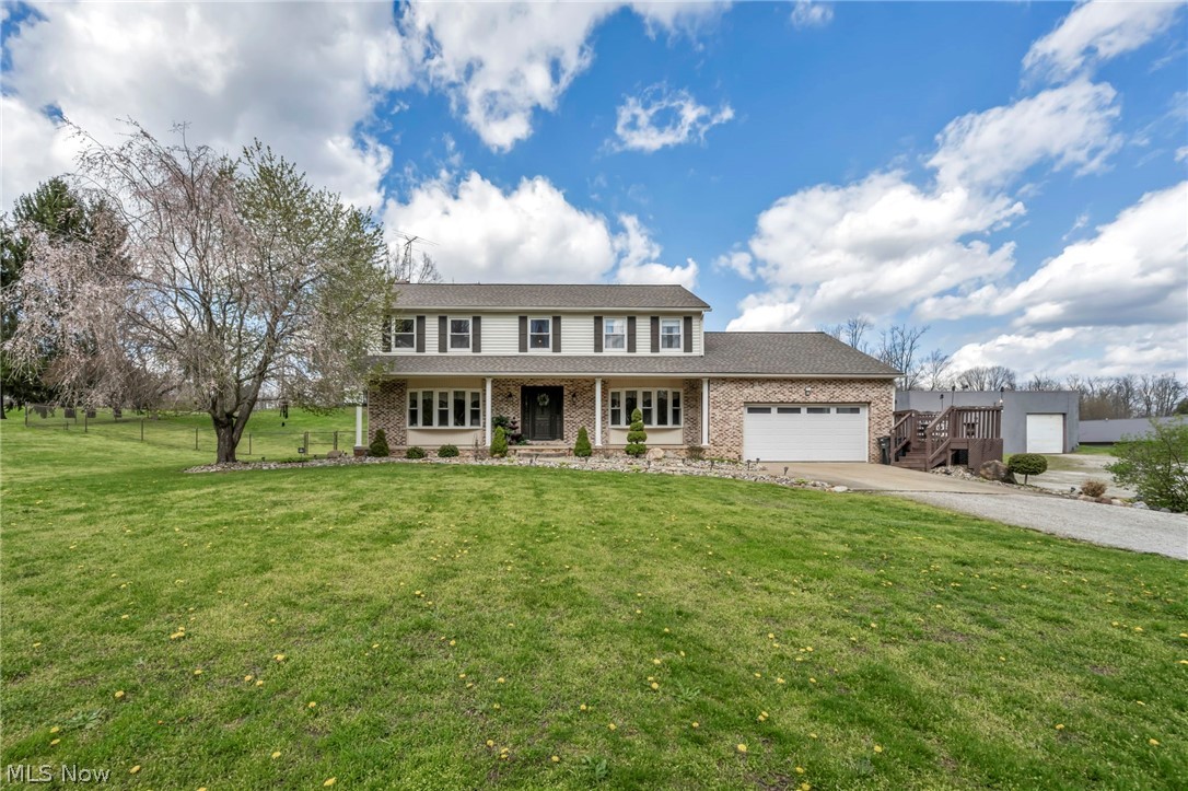 Welcome home to 2287 Trares Road, a STUNNING 4 bed, 2.5 bath colonial situated on 4.69 acres in Suffield! When you pull in, you will be in AWE with the TWO huge outbuildings! The front one is about 900 sq/ft & features 4 garage doors, an office and bathroom. The MASSIVE outbuilding is 7500 sq/ft & large enough to fit 30+ cars, sports courts, RV/Boat storage etc. It even has its own loading dock & features 3 large garage doors. The options are ENDLESS! When you step into the spacious entryway you'll fall in love with endless natural light, pouring in from each window. A step down living room/flex space will be perfect for a playroom/living area. The formal dining is just off the kitchen which features plenty of cabinet & countertop space. There is a pantry, space for an additional table & office/flex space with a slider leading you onto the deck that spans the length of the home! The family room has a wood burning fireplace & offers access to a 3 seasons room. This space has vaulted ceiling & a great area to store food for parties! This also leads to the deck overlooking your pool, hot tub, fenced-in yard patio w/ fire pit ('14) & water fountain ('14)! HOSTESS DREAM! Back inside, the first floor is completed with a laundry room, half bath & lot of closet/storage space! Upstairs, you will find the master suite with a huge walk-in closet and full bathroom. 3 additional great-sized bedrooms & a full bath complete this upper level. The basement is newly finished with so much additional living space, plush carpet & perfect man cave! The lower level is a walk out, has a wood burner for alternate heat source & features plenty of storage space! Updates include new roof on house & small shop '18, new AC '22, new windows '06, new Pella slider '25, new walk-out doors, front and back storm door '23, new master window '23, hardwood flooring '16, all new basement carpet, ceiling, paint, trim, '25, new deck built '14 w/ repairs '25, well pump '18, half bath '25 & more! Call today!
