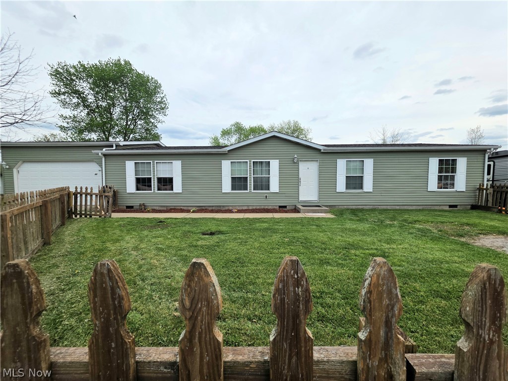 Waiting for a new owner is the marvelous 3 bedroom 2 bathroom home nestled in the heart of Mineral Wells, WV.  Offering 1,680 Sq Foot of comfortable living space, this home features both a living room and a family room, giving you plenty of room to relax and entertain.  The spacious kitchen is a true highlight complete with a center beautiful island.  The attached 2 car garage plus extra parking  provides exceptional parking available for guests.  Step outside to enjoy the fully fenced yard perfect for pets, children, or simply unwinding in your own private outdoor space.  With it's functional layout, generous storage, and a warm character throughout, this home checks all the boxes.  Whether you are a first-time buyer or lookin to downsize without sacraficing space, the property is ready to welcome it's next owners.  Don't miss this opportunity, priced to sell!  Schedule your private showing today!