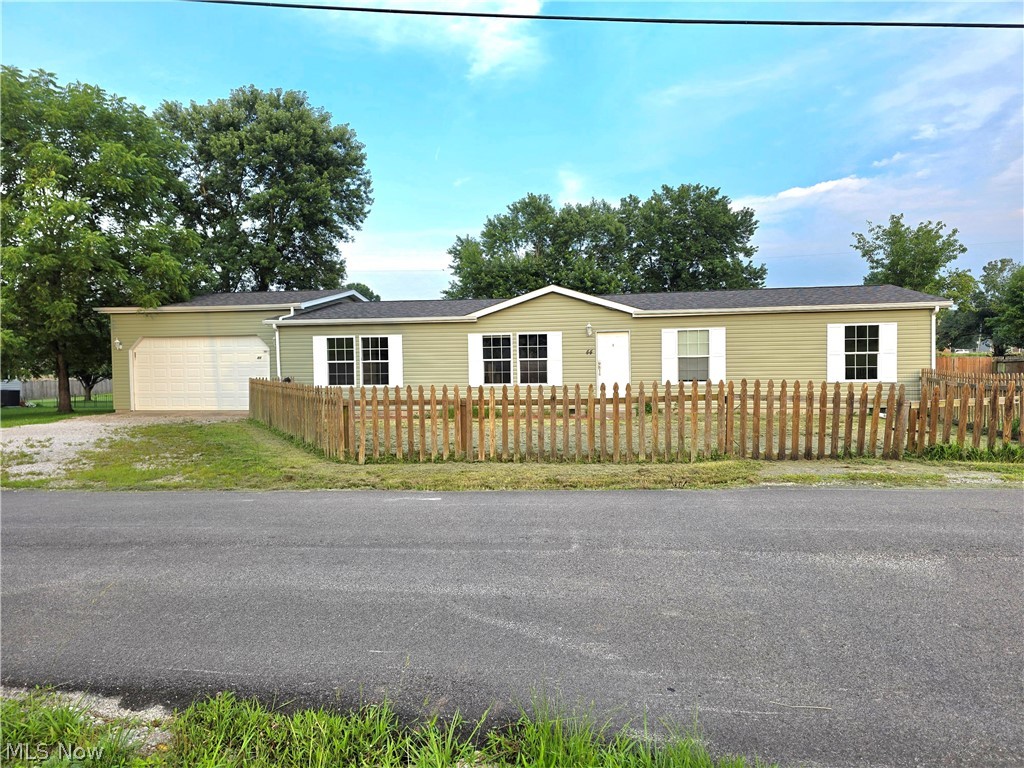 Waiting for a new owner is the marvelous 3 bedroom 2 bathroom home nestled in the heart of Mineral Wells, WV.  Offering 1,680 Sq Foot of comfortable living space, this home features both a living room and a family room, giving you plenty of room to relax and entertain.  The spacious kitchen is a true highlight complete with a center beautiful island.  The attached 2 car garage plus extra parking  provides exceptional parking available for guests.  Step outside to enjoy the fully fenced yard perfect for pets, children, or simply unwinding in your own private outdoor space.  With it's functional layout, generous storage, and a warm character throughout, this home checks all the boxes.  Whether you are a first-time buyer or lookin to downsize without sacraficing space, the property is ready to welcome it's next owners.  Don't miss this opportunity, priced to sell!  Schedule your private showing today!