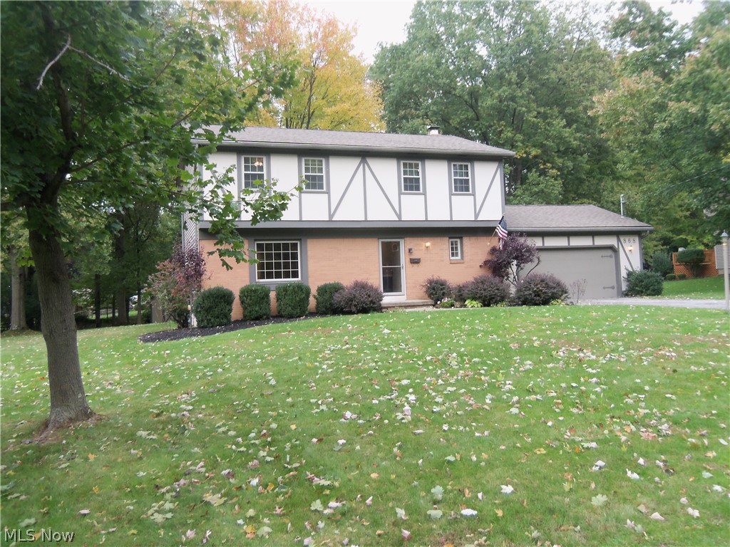 If you enjoy hiking, biking, golf and nature, this is the home for you! It is located only steps away from the neighborhood access to Mill Creek Metro Park with acres of hiking, biking, and nature trails, TWO 18 hole golf courses, lakes, streams, events and amenities that will appeal to everyone! Situated on a private wooded half acre lot complete with garden spots, fire pit and deck shaded by mature trees, home is < 1 mile from West Boulevard Elementary, < 3 miles from Boardman Jr. High and HS, and within 2 miles of shopping & dining. Open floor plan on the first floor with fresh and stylish updates. Kitchen recently remodeled with wood look tile floor, granite counters, new cabinets, fixtures and SS appliance suite. Dining area has been opened to kitchen and LR, and the family room, trimmed with crown moldings and a beautiful mantel offers the perfect space to relax by a unique looking fireplace. Upper level features 4 BR, including the master with private bath and hall bath. Make su