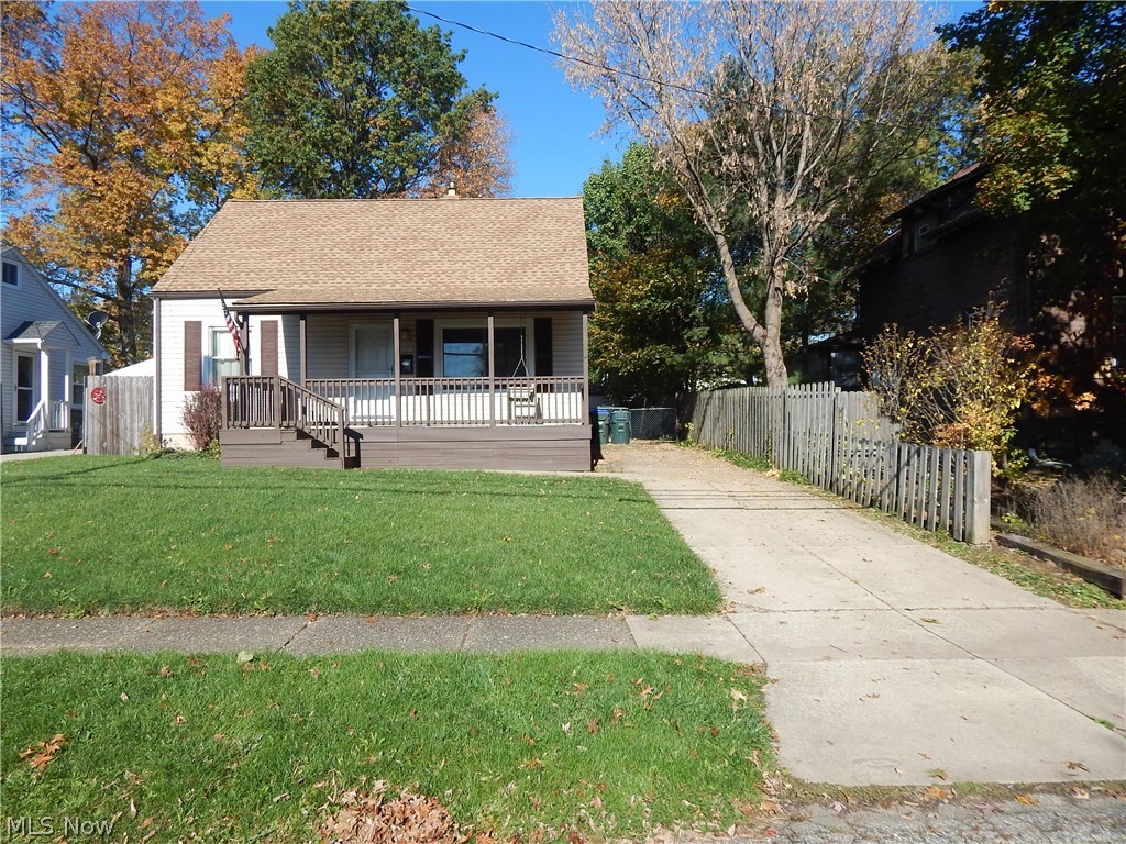Adorable and affordable!  Come enjoy the open front porch entering the hardwood floor living area. Two additional bedrooms on first floor. Updated bath and much more. Appl. kitchen featuring freshly painted interior. Oversize second floor bedroom offers private space. Rec. Room and laundry in Lower Level. 
Covered back deck along with fenced in rear yard. Newer roof, furnace and central air.  Near parks, schools and so much more.