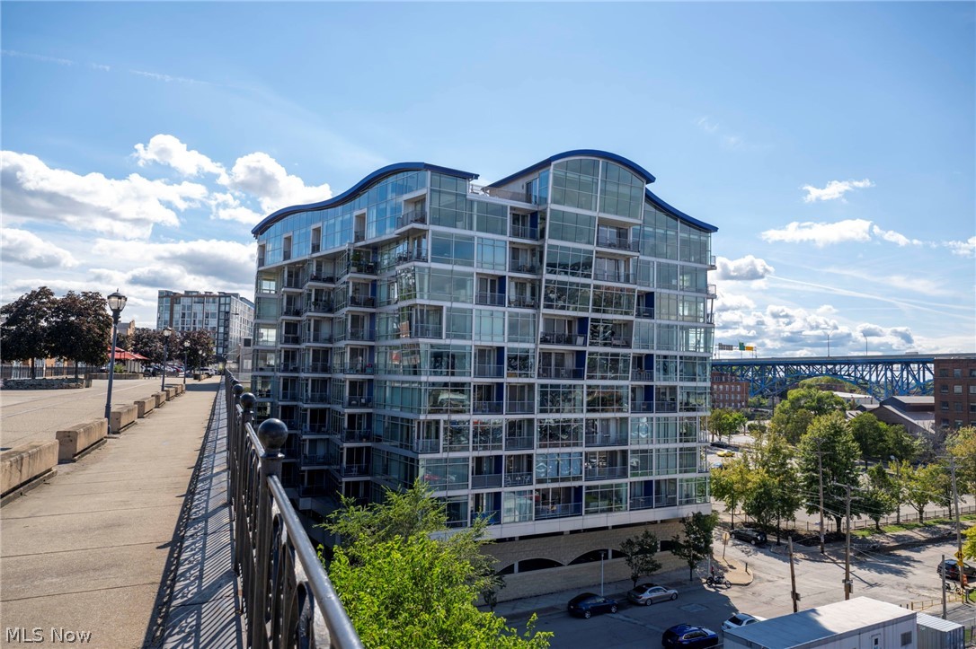 Discover this beautiful 2-bedroom, 2-bath condo offering breathtaking downtown views at The Plaza. Features include a large great room with wood laminate floors, large balcony with downtown views, island kitchen with granite counters, granite floor tile, unique maple cabinets with drawers and flip up doors, all appliances, large owners suite with dressing area, walk in closet and ensuite bathroom with walk in tile shower. The second bedroom with floor to ceiling windows and downtown views can also be the perfect space for a home office. An indoor gated parking space rounds out this condos many benefits. The Plaza has undergone a beautiful lobby renovation. If you have been here previously you won't recognize it. Two exercise rooms were recently completed and there is direct access from the building to the Superior Viaduct. Walkability is key here with many restaurants and music venues just a block away. Also walkable is Downtown, Ohio City and the Flats East Bank. Walk/bike to Edgewater Park and Whiskey Island via the Towpath and Lakefront Bikeways. Easy access to public transit and all major freeways leading to University Circle, Tremont, Gordon Square, Steelyard Commons and the airport.