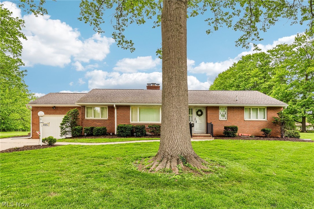 Welcome to this lovingly maintained, one-owner 3-bedroom, 1.5-bath brick Ranch situated on approximately 1.5 acres across two parcels. Offering 1,661 square feet of comfortable living space, this home features a spacious living room with a gas fireplace, a formal dining room, and an inviting family room. The fully applianced kitchen includes a dinette area, double ovens, dishwasher, mixer cabinet, pantry with pull-out shelving, and a built-in desk. The primary bedroom offers double closets, and all three bedrooms feature hardwood floors. The full basement has been professionally waterproofed and includes glass block windows and a shower, offering excellent storage and future finishing potential. Recent updates include roof (2018), hot water tank (2020), and gutters and soffits (2022). Additional amenities include a water softener, patio, and attached one-car garage. A rare opportunity with the potential to purchase an additional 1.75-acre lot with frontage on Copley Road. This exceptional home has been meticulously cared for and is ready for its next chapter.