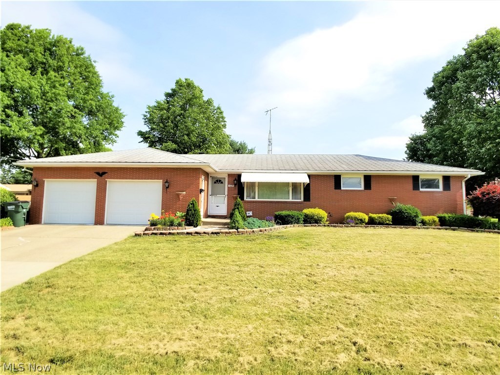 Real Estate: Clean, updated brick ranch home on nice corner lot features living room w/beautiful hardwood floors, kitchen w/birch cabinets, newer appliances, pantry, ceiling fan and dining area, hallway w/closet, 3 first floor bedrooms w/sliding door closets and ceiling fans, ceramic tile bath w/shower/tub, family room w/wood burning fireplace and hardwood floors w/sliding glass doors leads to wood deck and koi pond, 2nd full bath w/marble tile shower and ceramic tile floor, all on one floor. Finished lower level w/rec room, 4th bedroom, laundry room, shower and additional rooms. High effeciency gas furnace, central air, breaker electric, all public utilities and security system. Private concrete driveway, 2 car attached garage and a 9X12 storage barn. Parcel #9200656. Nicely landscapped corner lot 76x140. North Canton Schools. Current half year taxes approx. $958. Convenient to parks, schools and shopping! Opportunity knocking w/this good looking, clean, brick ranch home in a good con