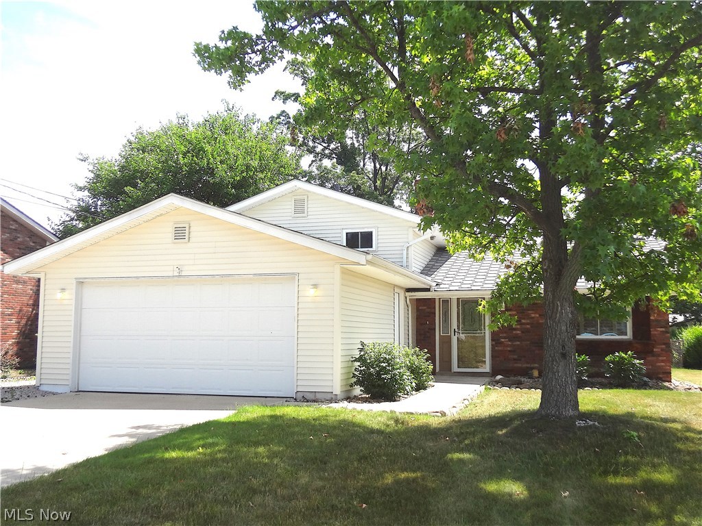 4-Level Split in Northfield with many updates! Starting with the Curb Appeal, you will be delighted! Vinyl Sided with Attached 2 Car Garage, Newer Paved Drive with extra area for additional parking leads to Park Liked fenced back yard lined with Privacy Bushes, Oversized Deck with Retractable Awning perfect for entertaining and Large Shed. This Yard is a pleasant surprise and not to be missed! All this and you haven’t even been inside yet! You enter into Vaulted Ceilings, Laminate Flooring, and a gorgeous Remodeled Kitchen with Corian Counter tops, Under mount Sink, Walls of Cabinets and Large Eating Area. Living Room features a Sun Tunnel and opens to the Dining Room which overlooks the Deck. Remodeled Bathrooms, Lower Level Family Room and 4th Bedroom Plus a True Basement with Stall Shower that has been waterproofed and Great for storage! Newer Furnace, C/A, Sump Pump, Windows, Sewer line, and Cement. Much more !