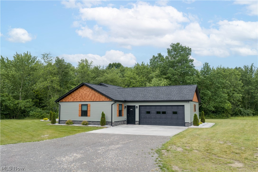 Enjoy peaceful country living in this newly constructed ranch home situated on approximately 3 level acres. Designed with comfort and convenience in mind, this home offers an open-concept kitchen, dining, and living area that's ideal for both everyday living and entertaining.
The spacious primary suite features a walk-in closet and private en-suite bath complete with a walk-in shower. Two additional bedrooms and a full bath provide plenty of space for family, guests, or a home office. A convenient hallway closet laundry area, and all appliances included make this home truly move-in ready.
Step outside through the sliding glass doors off the dining area to a large stamped concrete patio featuring a built-in fire pit, the perfect spot to relax and enjoy the peaceful surroundings.
Built with energy efficiency in mind, this home offers enhanced insulation features designed to maximize comfort while helping minimize utility costs, including R-19 insulated exterior walls and additional insulation beneath the luxury vinyl plank flooring. If you're looking for modern construction, quality craftsmanship, and a quiet country setting, this property is a must-see! Additional 
Acreage available for purchase. * While this is a Boliver address use Strasburg as city in GPS.*