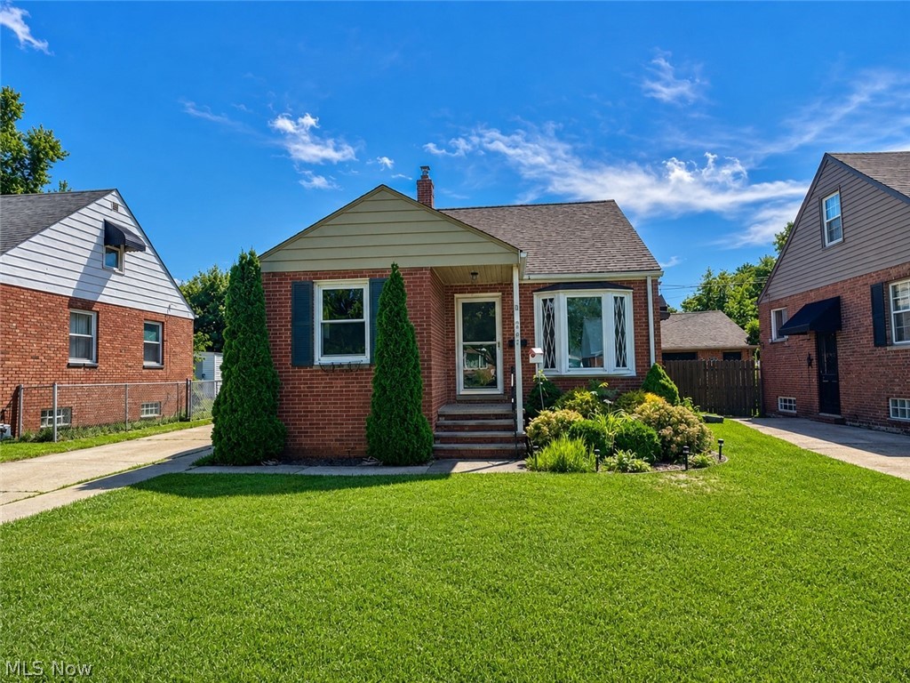 Attention investors and buyers looking to add their finishing touches! This charming 3-bedroom, 1.5-bath brick Cape Cod offers great potential with classic character throughout. The inviting living room features a large bow window that fills the space with natural light, along with beautiful hardwood floors. The eat-in kitchen comes fully applianced and offers built-in shelving, a comfortable dining area, and brand-new LVT flooring. The first floor includes two nicely sized bedrooms with wood flooring and a full bath. Upstairs, you’ll find a spacious primary bedroom with abundant natural light, extra closet space, additional storage, and a convenient half bath. The lower level provides plenty of storage, laundry space, and room to make it your own. Outside, enjoy a fully fenced backyard and an extra-large 1-car detached garage. Conveniently located close to parks and just minutes from Lake Erie. Roof 2011, HWT 2025.
