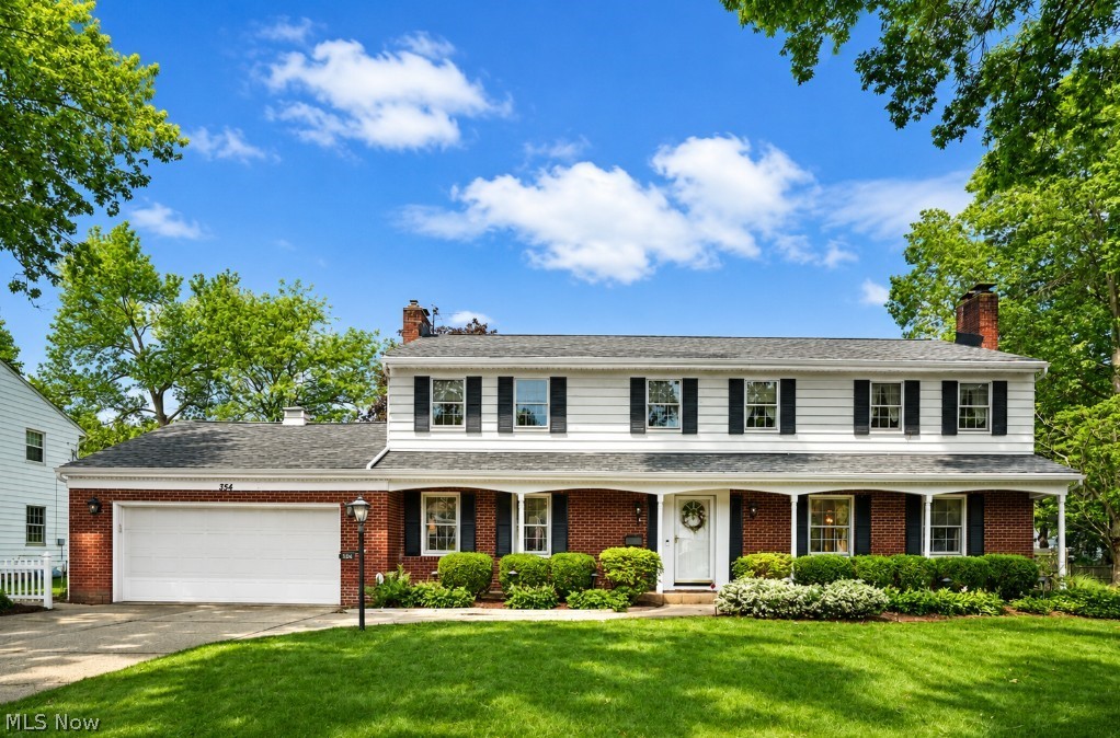 Come see this timeless 4-bedroom, 2 full and 2 half bath brick Colonial nestled on a quiet street in desirable Fairlawn Reserve. The chef's kitchen serves as the heart of the home and opens to an expansive sunroom with fireplace, creating the perfect space for everyday living and entertaining. Step outside to the beautiful brick patio overlooking a gorgeously landscaped, private backyard. A cozy den with fireplace, formal living room, dining room, laundry room, and half bath complete the main level. Upstairs, you'll find a spacious primary suite with a large dressing room, along with three additional bedrooms and a full bath. The finished lower level offers over 600 square feet of additional living space, featuring a rec room with bar and plenty of room for entertaining. Additional highlights include a 2-car garage, sprinkler system, security system, new furnace and A/C (2024), and new hot water tank (2023). Conveniently located near Sand Run Parkway, Pilgrim Square, Fairlawn Country Club, shopping, dining, and more. Don't miss this exceptional opportunity in one of Fairlawn's most sought-after neighborhoods!