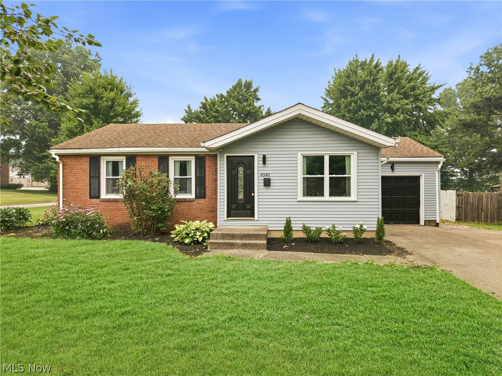 Welcome to 4340 Maureen Drive in Austintown Township, where style, comfort, and modern updates come together in this beautifully renovated 3 -bedroom, 2  full-bath Ranch. Situated on a desirable corner lot within the Austintown Local School District, this home offers outstanding curb appeal and is truly move-in ready. Step inside to a bright and inviting living room featuring brand-new carpet and updated light fixtures. The hallway showcases attractive board-and-batten accents, leading into a stunning open kitchen complete with tile flooring, a large center island, custom cabinetry, granite countertops, a tile backsplash, and brand-new stainless steel appliances. The main level offers three nicely sized bedrooms with fresh carpet and updated light fixtures throughout. The spacious primary suite features a beautifully updated full bathroom with a walk-in tiled shower, new vanity, new flooring, and modern lighting. A second full bathroom off the hallway includes a tub with tile surround, an updated vanity, and new light fixtures. The finished lower level adds exceptional living space with tile flooring, poured concrete walls, a modern black-painted ceiling with recessed lighting, and plenty of room for entertaining, a family room, home gym, or recreation area. You'll also find a laundry area, abundant storage, a 100-amp electrical panel, high-efficiency furnace and central air conditioning, and a newer hot water tank. Outside, enjoy a freshly painted deck overlooking the fenced backyard, complete with a massive storage shed for all your outdoor equipment and hobbies. A one-car attached garage and excellent location complete this impressive property. Don't miss your opportunity to make this beautifully updated home your own, schedule your private showing today!