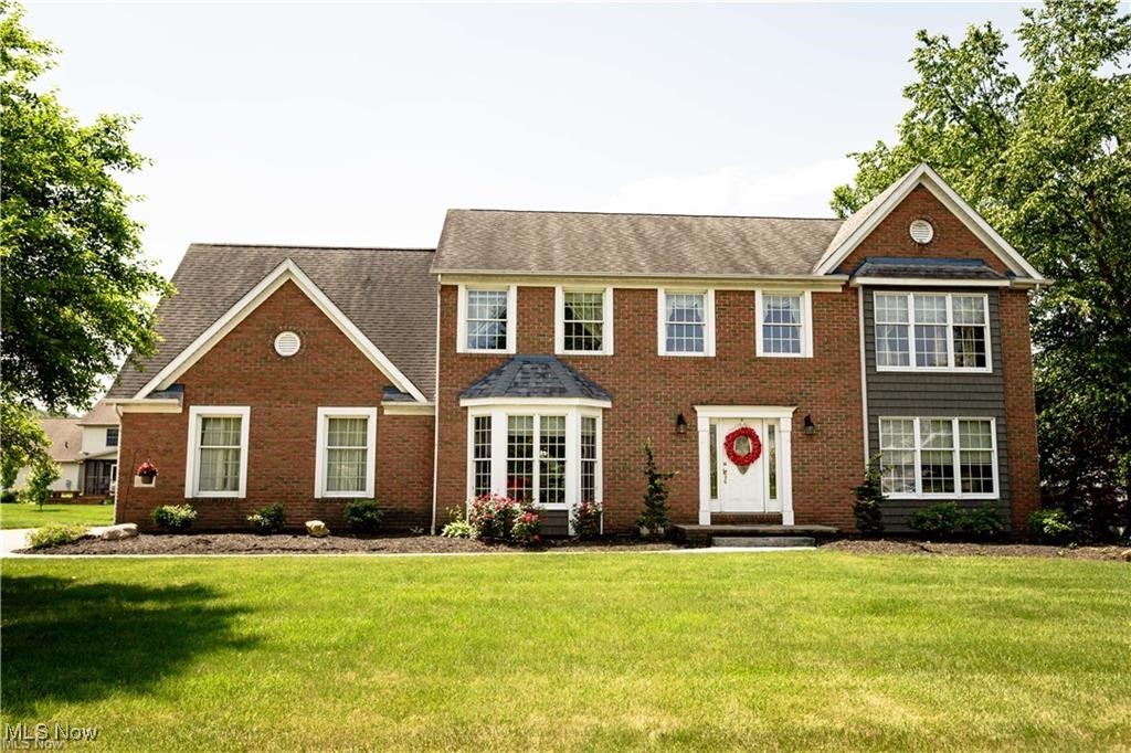 Great 4 bedroom, 2.5 bath home in Jackson Township with over 3,200 sq. ft. of living space. Enter the foyer featuring hardwood flooring, dining room to the left and office with french doors to the right with bookshelves.  Another set of french doors leads into the family room with fireplace.  Walk hrough the family room into the updated kitchen with soft close cabinets, granite counter tops, stainless appliances, a coffee bar area with beverage/wine refrigerator, hardwood flooring and plenty of cabinet and counter top space. Off the foyer hallway is an updated half bath, a formal dining room with bay window, a small 1st floor laundry room with lockers.  Relax with your morning coffee or your evenings in the enclosed sunroom that leads to the stamped concrete patio overlooking the back yard. Upstairs has a large owners suite with cathedral ceiling, a private owners bath with stand alone shower, garden jacuzzi tub and a walk in closet, 3 additional bedrooms and another full bathroom. Home has a 2 car attached garage with opener, new electric car outlet, a full unfinished basement with new electrical panel with potential to be finished while offering plenty of room for storage, a newer high efficiency furnace and A/C, a newer cement driveway and more. Home is conveniently located in a great neighborhood close to shopping, grocery stores, schools, along with everything Jackson Township has to offer. List of upgrades by owner are attached as a supplement.