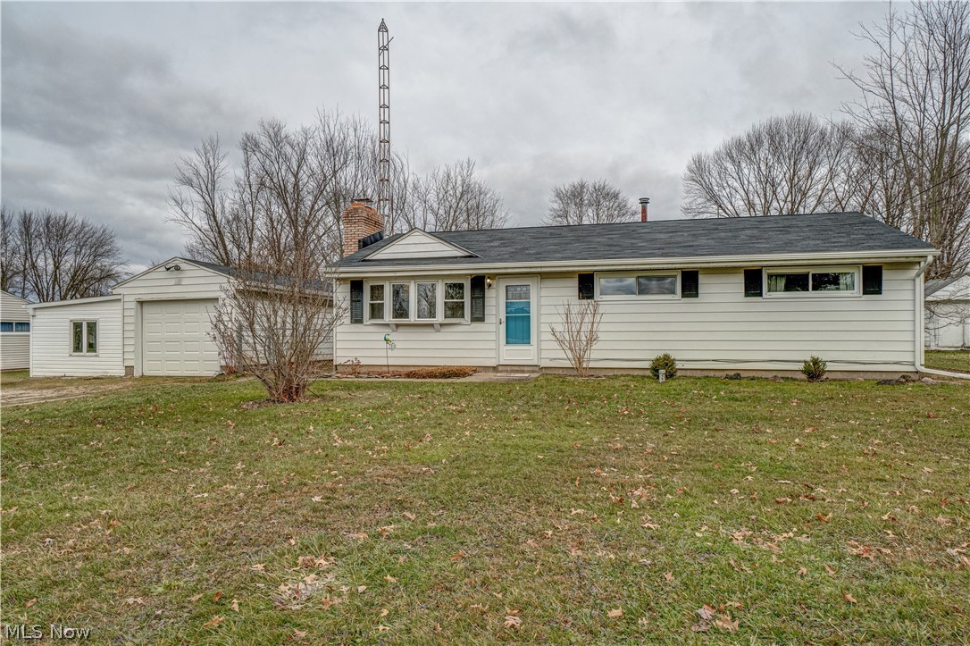 Check out this adorable Ranch home in Marlington School district.  You have everything you need all on one level! Walkthrough the front door into the living room with a wood-burning fireplace.  Just off the living room is a large, fully applianced kitchen with plenty of cabinetry.  This space is open to the dining room both with newer laminate flooring.  Off the dining room is a huge screened-in sunroom that overlooks the large fenced in backyard.  The lot feels spacious with nearly a half-acre of land. Three bedrooms and a full bathroom with a bathtub complete this home.  Schedule your showing in advance before this one is gone!