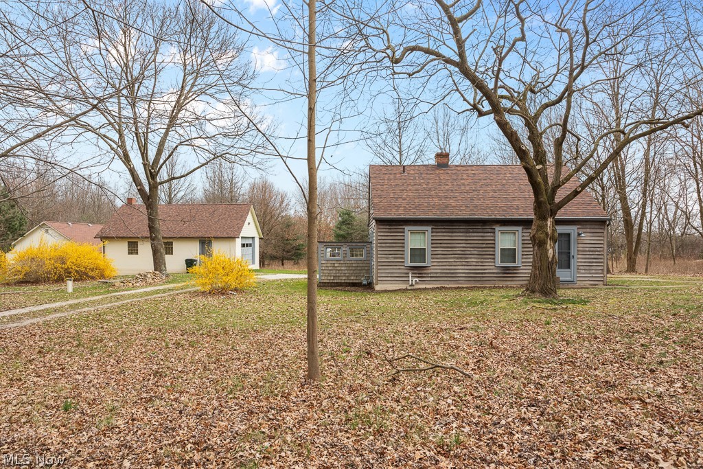 Wow! Look at this unique property! Marlington Local Schools/Washington Township with over 5.5 acres, mostly wooded. Updated windows, newer septic, and roof. House has 1 bedroom currently but possibly 1-2 more could be made into or added. 2 unbelievable buildings! Concert block buildings, one with water, electricity, and heat in immaculate condition. The whole property has been well cared for and taken care of. The seller has added some unique built-ins and extras to the property that you truly need to see to be appreciated. Take a look at this property! The possibilities are endless here. Turn the buildings into living spaces, have an in-home business, plus much more.