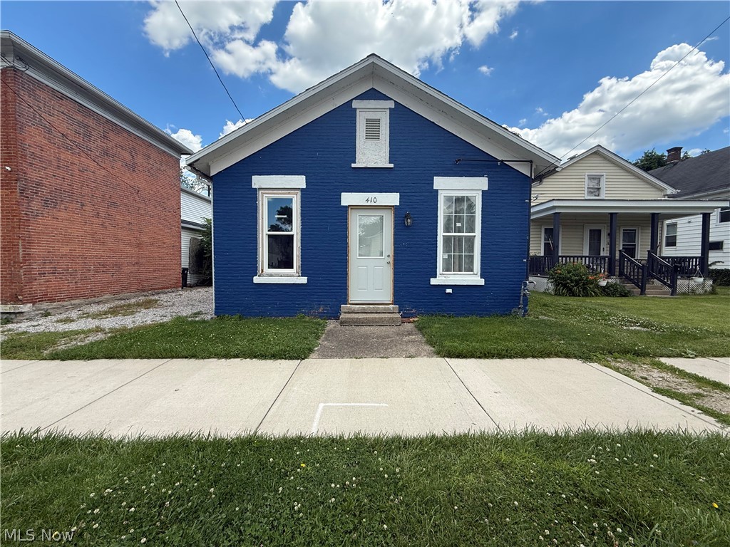 Opportunity awaits at 410 Perry Street of Sandusky! This two bedroom home offers tremendous potential for investors, flippers, landlords or buyers looking to build equity. Renovations have been started but remain unfinished, creating the perfect blank canvas to complete the project your way. Selling AS IS. Cash buyers or renovation loan purchasers only. The exposed brick and ceilings brings the extra charm! The nice back yard and covered back porch offer the space to relax and enjoy the outdoors. Located just a quick walk from the Historic Downtown Sandusky, waterfront, attractions, restaurants, shopping, entertainment and the Sandusky Bay. Jump on the boat for a quick ride to the Lake Erie Islands! The property location places you near the ongoing downtown revitalization efforts and redevelopment projects that continue to enhance the area's appeal and investment potential. Whether you're looking for your next investment property, rental opportunity, or an affordable starter home with vision, this property offers plenty of upside in a growing market. Bring your ides and unlock the potential of this Sandusky opportunity! The plumbing and electric and most drywall has been completed. City of Sandusky Inspection on plumbing and electrical is completed and approved. Serious inquires only. Verification of funds or rehab financing must be provided with all offers.