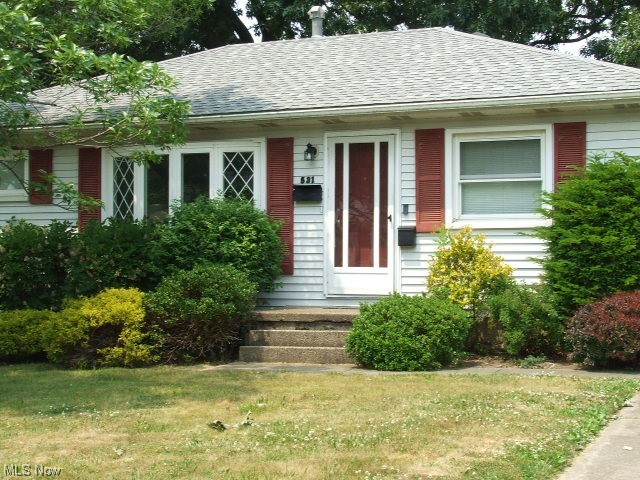 Cute 3-bedroom Ranch with large front bay window that lets in lots of natural light into the living room, which is open to dining area with another front window. Large, fully applianced kitchen with lots of counter space and cupboards, leads to partially finished basement with rec room, workshop area, bonus room and laundry area.  First floor has 3 nice sized bedrooms and full bathroom.  Hardwood floors in living room, dining rooms and bedrooms. Partially fenced-in backyard has 2 patios, one is perfect for firepit, plus 1-1/2 car detached garage with electric.  Newer windows, glass block windows. 
Property sells "As Is", seller will make no repairs.