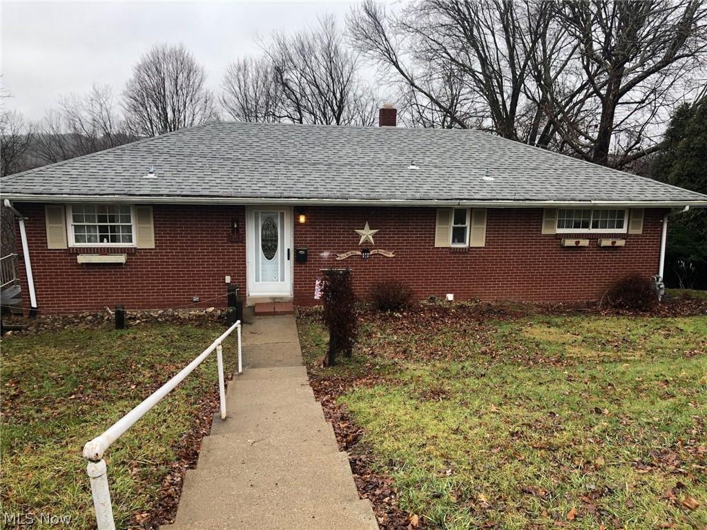 Updated brick ranch with fully finished basement.