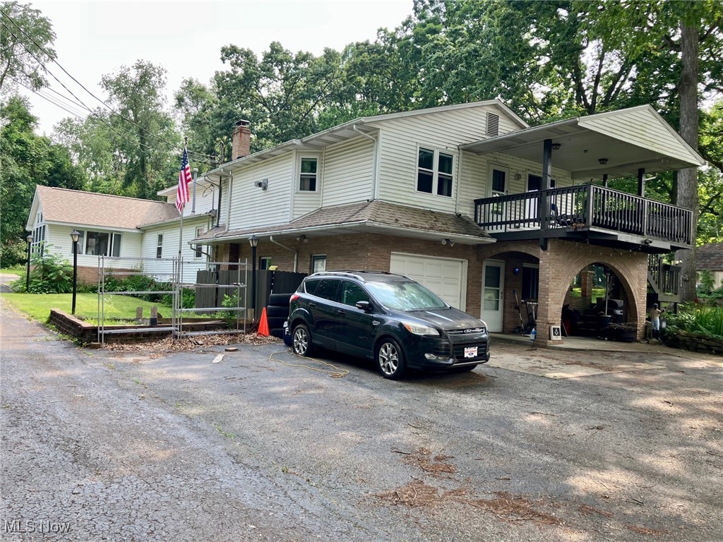 Welcome to 1086-1088 Buena Vista Dr. in the Springfield LSD.   Excellent investment opportunity for this 2 unit duplex with 3,964 total living space, over half acre lot, new roof Spring 2021 main home, and 24 x 40 detached garage with lean to, gas heat and workshop.   This would be a perfect fit for a multi generation family, tenant / tenant or an owner / tenant scenario.  The back unit has 2 bedrooms (6 total bedrooms, 2.5 bath total this unit) and a large full bath on the ground floor, spacious sun room, dining room and living room with 2 additional bedrooms upstairs and a half bath.  The large basement also contains 2 additional bedrooms, small kitchenette and full bath.  The front unit has 2 separate entrances (one upstairs and one down) kitchen, 2 bedrooms (4 total), a full bath and 1-2 bedrooms downstairs.  Ample parking for both units front and back, close to shopping, highway and schools.  Full appraisal upon request.  Appraised February 2025 (and uploaded this MLS listing).