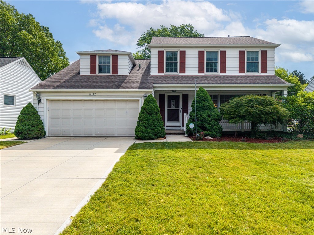 Welcome home to this 4-bedroom, 2.5-bath colonial in desirable Fairview Park! Being offered by only its second owner, this home combines quality craftsmanship with thoughtful updates throughout. The spacious kitchen features granite countertops, a butcher block island, custom Amish-built cabinetry, and a pantry for exceptional storage. The inviting family room is highlighted by a cozy gas fireplace, while updated flooring throughout the home was redone in 2022. The oversized master suite offers plenty of space to relax and unwind and includes an en suite bath. There are three more spacious bedrooms on the second floor. Additional updates include a newer hot water tank and a newer 100-amp electrical panel. The home is equipped with a Trane furnace and A/C, and both gas and electric hookups are available for the dryer. Enjoy outdoor living from the charming full-length front porch or the covered backyard porch overlooking a beautifully maintained yard complete with an irrigation system in the front yard, a fire pit, permanent gas grill, and storage shed. The attached two-car garage features a gas heater and additional storage space, making it ideal for year-round use. This well-cared-for home offers comfort, functionality, and timeless appeal in a fantastic Fairview Park location. Don’t miss this opportunity!
