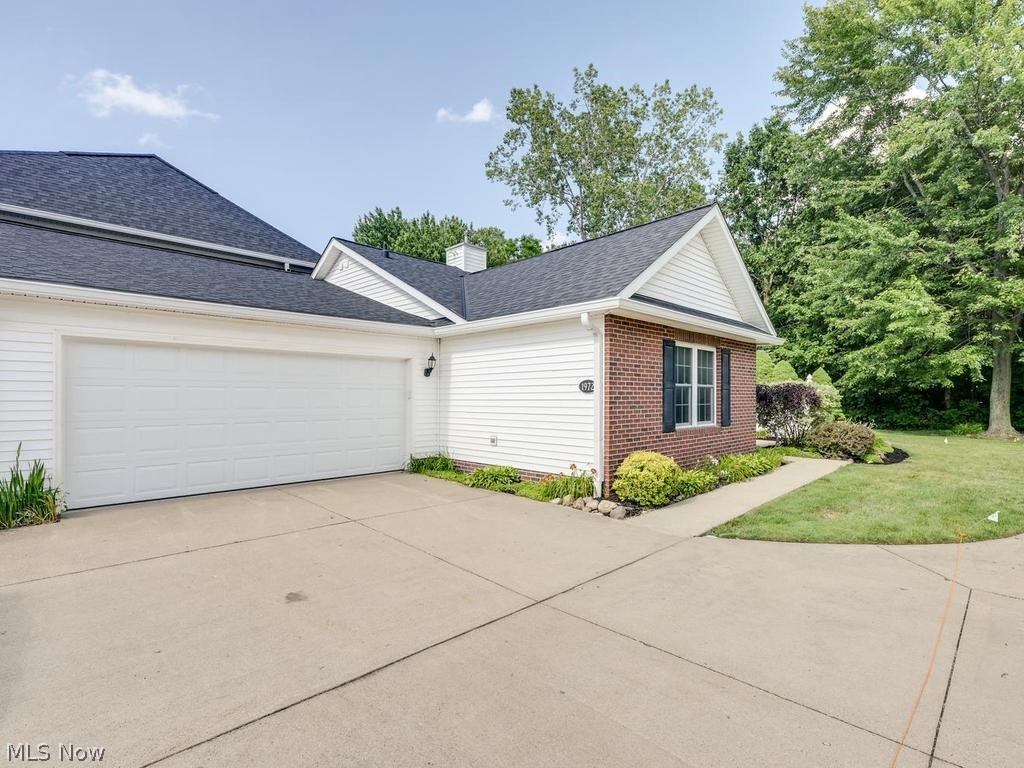 Welcome home to this beautifully remodeled 2-bedroom, 2-bathroom ranch-style condominium in desirable Painesville Township. Offering easy one-floor living and an exceptional level of privacy, this move-in-ready home combines modern updates throughout with a serene natural setting.
Step inside to a spacious great room featuring a soaring vaulted ceiling, a stunning gas fireplace, and an impressive 6-foot ceiling fan. Large windows provide peaceful views of one of two private patios and the wooded backdrop beyond. The open layout flows seamlessly into the dining area and fully renovated kitchen, showcasing new cabinetry, granite countertops, updated fixtures, and all-new stainless-steel appliances.
The primary suite offers a luxurious retreat with a beautifully remodeled bathroom featuring a large American Standard soaking tub, towel warmer, and stylish finishes. The second full bathroom has also been completely updated. Throughout the home, you'll find new luxury vinyl plank flooring, new carpet in the bedrooms, and fresh paint on all walls, ceilings, and trim including the garage.
Outdoor living is a true highlight, with two private patios overlooking woods and a pond. The rear patio enjoys exceptional seclusion and is not visible from neighboring units, creating a peaceful setting rarely found in condominium living. Minimal shared walls with adjoining units further enhance the home's quiet, private feel.
Additional updates include a new garage door and opener, plus a spacious two-car attached garage.
This thoughtfully renovated home offers the perfect blend of comfort, style, and privacy, all in a convenient Painesville Township location. Simply move in and enjoy.