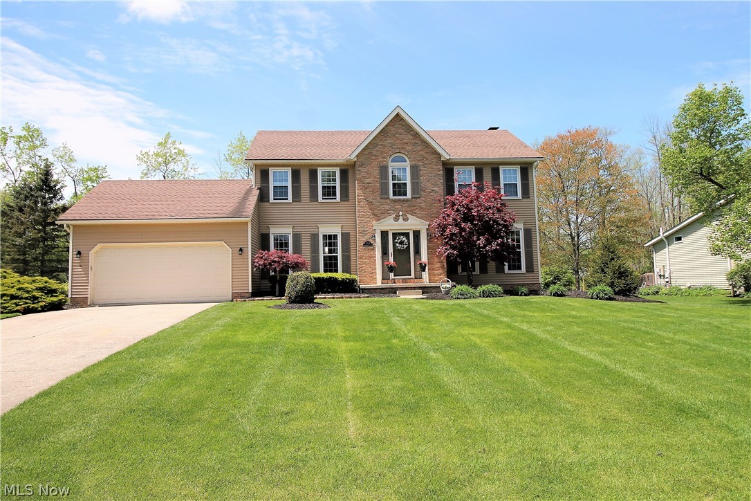 Welcome to this four bedroom, two and a half bath classic colonial home.  The sensational open floor plan is great for entertaining and has a family room with 
a wood-burning fireplace and new bay window overlooking the spacious, private backyard.  The updated kitchen has ceramic tile throughout, stainless steel appliances, beautiful oak cabinets, tile back splash, and recessed lighting.  The eat-in kitchen area contains a new, rear slider door which opens onto the completely refurbished and stained deck 2016.  The dining room and living room are off of the foyer while the half bath and laundry room are off of the kitchen completing the first level. The second level contains four bedrooms.  The master suite offers a newly remodeled master bath 2018 consisting of a new tile shower, marble top double vanity, tile floor, and new fixtures.  New hard-wired smoke detectors on all three levels. The finished lower level offers new carpet 2019 along with a unique, knotty pine ceiling.  Office