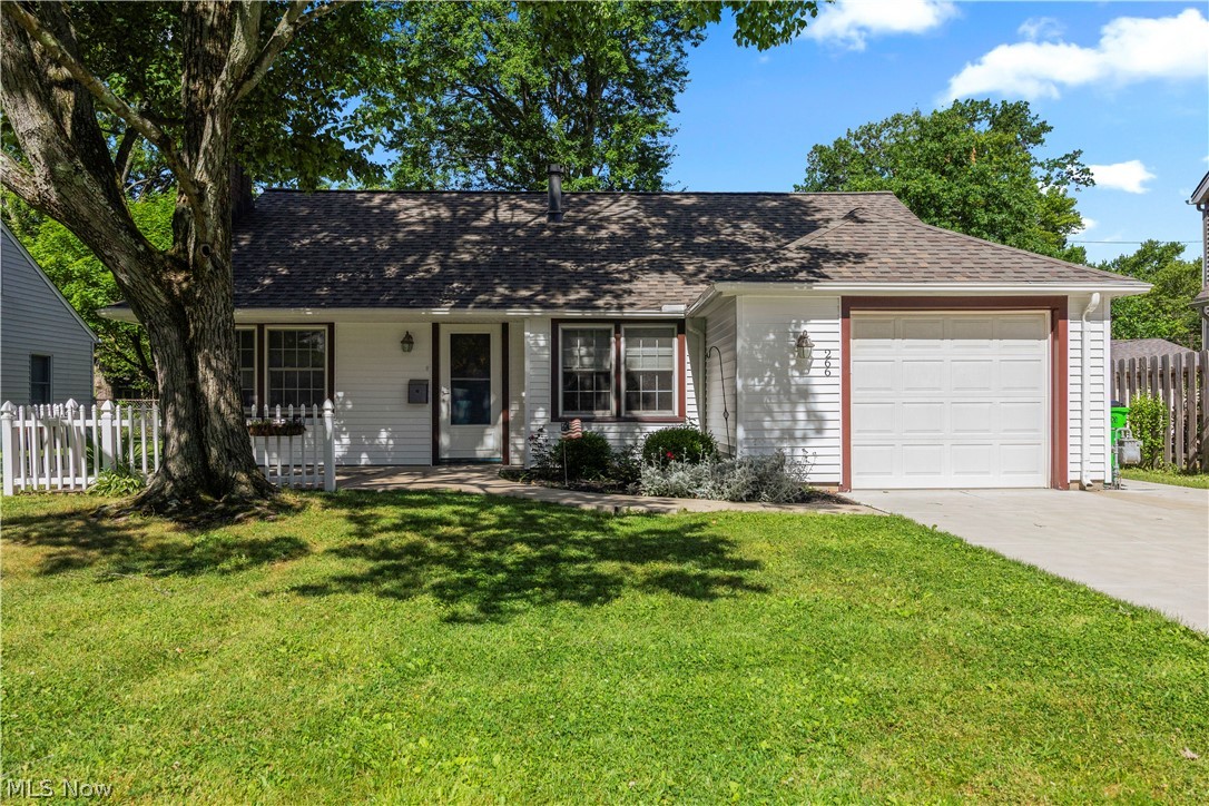 Opportunity awaits on one of the area's most sought-after streets! This charming Bungalow-style home offers 1,304 square feet of living space and is ready for its next chapter. While the home could benefit from fresh paint and new flooring, many of the major improvements have already been completed, making it an excellent opportunity for owner-occupants, investors, or buyers looking to build equity.

The main level features three bedrooms, a full bathroom, a spacious living room anchored by a classic wood-burning fireplace, and a bright kitchen with refaced cabinetry and durable ceramic tile flooring. Upstairs, you'll find a large tandem bedroom/flex space with newer carpeting, providing versatility for a primary suite, home office, hobby room, or additional living area.

Additional updates include a new roof (2024), replacement windows (2019), water heater (2020), and a Trane furnace (2003). The kitchen appliances are all approximately five years old or newer, and the portable air conditioning units will remain with the home.

Outside, enjoy a mostly fenced backyard featuring a stamped concrete patio, storage shed, and plenty of room for outdoor entertaining, gardening, or pets. The one-car attached garage offers a man door and water source, while the driveway was widened in 2024 for added convenience. A welcoming front patio adds to the home's curb appeal.

Being sold as-is, this well-loved home offers solid bones, desirable updates, and an outstanding location. Bring your decorating ideas and make this property your own!