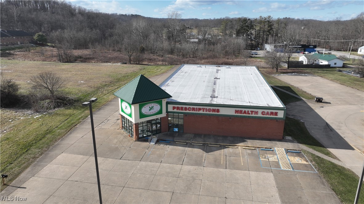 Former pharmacy offering excellent visibility and an existing building previously configured for retail/pharmacy use. Constructed in 1996 with then-current building codes in mind, the property provides a solid, adaptable structure suitable for a variety of commercial uses.