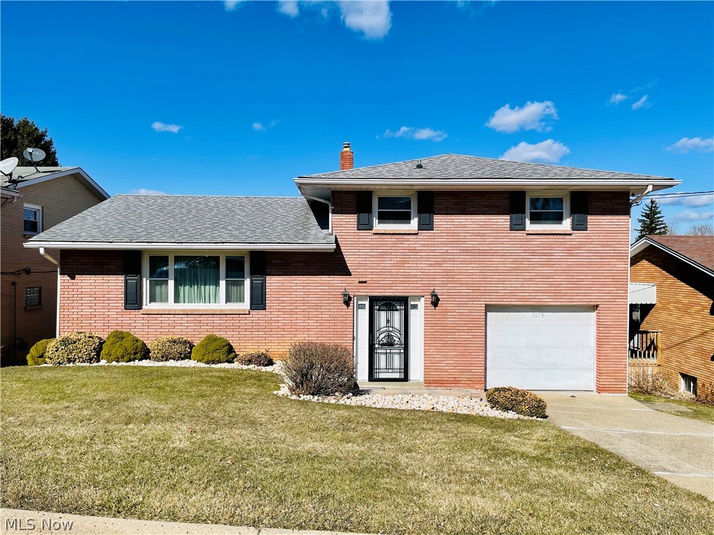 Exquisite, crisp and clean brick home located in Steubenville. This home has it all and is close to all amenities. This home welcomes you into a bright and airy foyer with access to the formal living, family, and powder room. From the formal living you will find a large eat-in kitchen with access to the family room. Off the family room you have a nice deck with views for days. Up stairs you will find three bedrooms and one full bath. Down stairs you have a rec-room, summer kitchen, and laundry. The back yard is two tiered. the first tier is fenced in with a patio. Home features new windows, furnace, AC, Deck, retaining walls, soffit, and fascia. Basement is plumbed for second bathroom. This is an original owner home non smoker no pets.