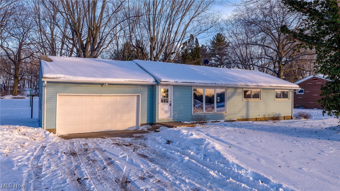 Welcome home to this fully updated 3-bedroom, 1-bath ranch located in Lake Township and Lake Local School District. Situated on a spacious lot of over half an acre, this property offers the perfect blend of modern updates and a peaceful, rural setting.

Step inside to find all new flooring throughout, updated light fixtures, and a bright, open feel. The completely renovated kitchen features new cabinetry, granite countertops, classic subway tile backsplash, and brand-new stainless steel appliances. Enjoy outdoor living on the rear deck overlooking the expansive backyard, complete with mature trees that provide a serene backdrop. An attached two-car garage adds convenience and additional storage, plus an additional concrete parking pad.

With great schools, a quiet country atmosphere, and thoughtful updates throughout on a single floor, this move-in-ready ranch offers comfort, style, and space—inside and out. A must-see in Hartville! *Property is agent owned