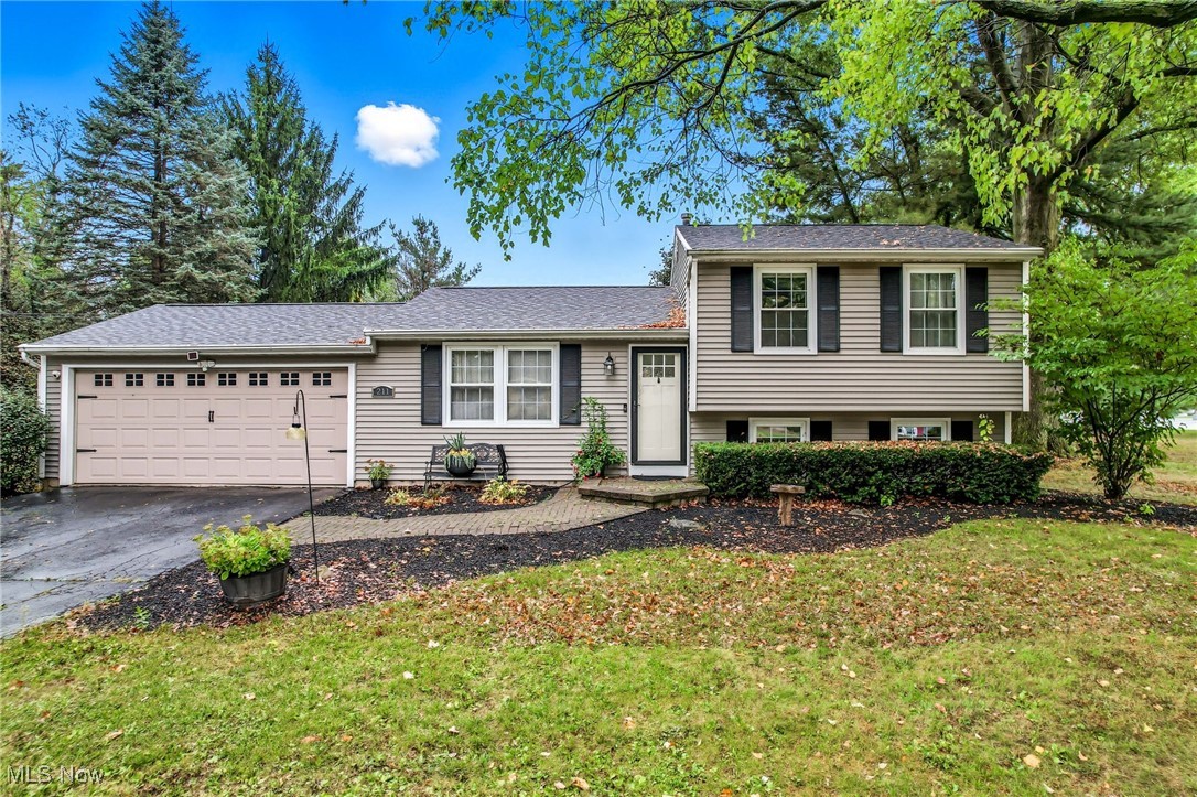 Welcome to this charming three-level split located in Lakeview schools & situated on a half-acre lot with no direct neighbors on either side. Nestled on a quiet street yet conveniently close to both schools, this home offers privacy and accessibility. Inside, you’ll find three bedrooms and two full baths, along with a comfortable family room. The updated kitchen features granite countertops, a center island, a coffee bar, and plenty of cabinet space. All stainless-steel appliances—including stove, microwave, and dishwasher—will stay. From the kitchen, step outside to enjoy a two-tier deck and patio overlooking a tree-lined backyard, perfect for relaxing or entertaining. The lower level includes a spacious family room, a full bath and a spacious laundry room with abundant storage. Additional features include a backyard 10x20 storage shed with a loft (new 2021), providing even more utility and a 2 car attached garage with a convenient man door to the outside. Other updates include:  new roof 2020, recessed lighting in the living room & all newer ceiling fans throughout.  This move-in ready home combines modern updates with a functional layout, making it a great choice for today’s lifestyle. This lovely home qualifies for $0 downpayment USDA 100% financing for those who qualify!!!  YAY!!