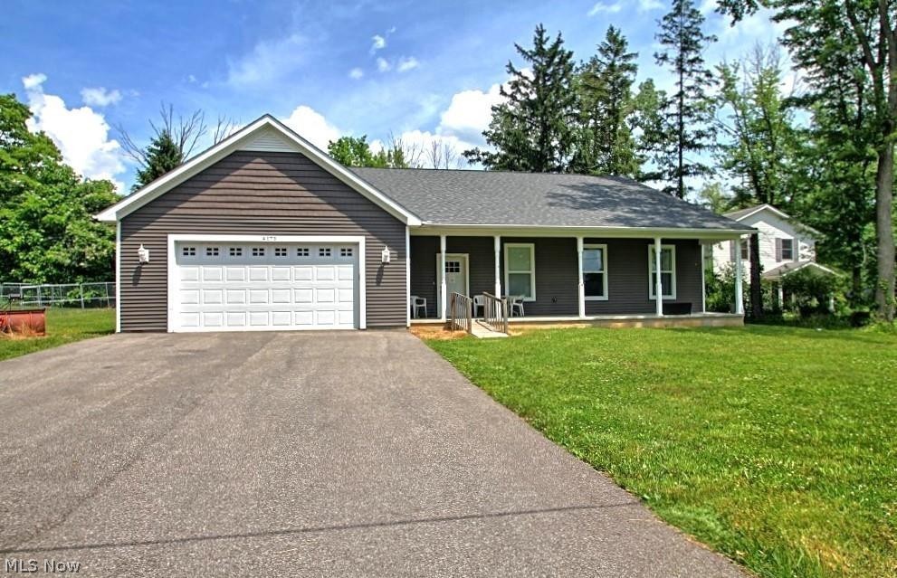 Spacious ranch-style home offering 4 bedrooms and 4 full bathrooms, located in a quiet residential setting. Three bedrooms include en-suite full bathrooms, providing added convenience and privacy. The main living area features an open floor plan connecting the kitchen, dining, and living spaces. The kitchen offers ample cabinet storage and workspace. The home includes accessibility-focused features such as wider doorways and modified bathroom layouts. The primary suite includes a large walk-in shower and generous closet space.