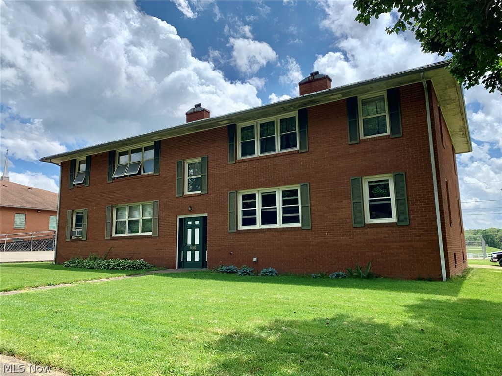 Solid, quality investment property in close proximity to Coshocton public schools. There are a total of four units, each offering 2 bedrooms, 1 bathroom, eat in kitchen, living room and plenty of storage. The units offer baseboard electric heat, window air conditioning and four individual storage space in the walk out basement. Also featured is a detached four car garage and a large parking area. Two upper units generate $500 per month and two lower units generate $525 per month.