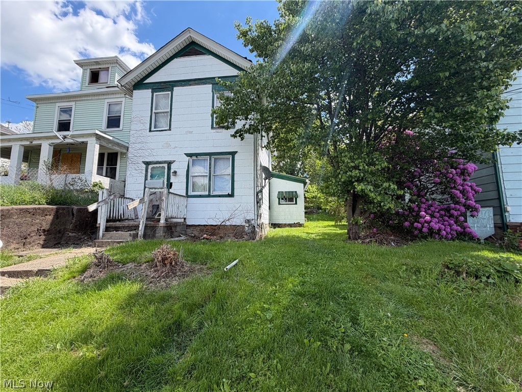 Opportunity awaits with this two-story fixer-upper full of potential! The main level features a living room, dining room, kitchen, full bathroom, and convenient first-floor laundry. Upstairs, you’ll find two bedrooms offering comfortable living space. Step outside to enjoy the covered back patio overlooking the nice backyard — perfect for relaxing or entertaining. Whether you’re looking for your next investment property or a home to renovate and make your own, this property offers plenty of possibilities.