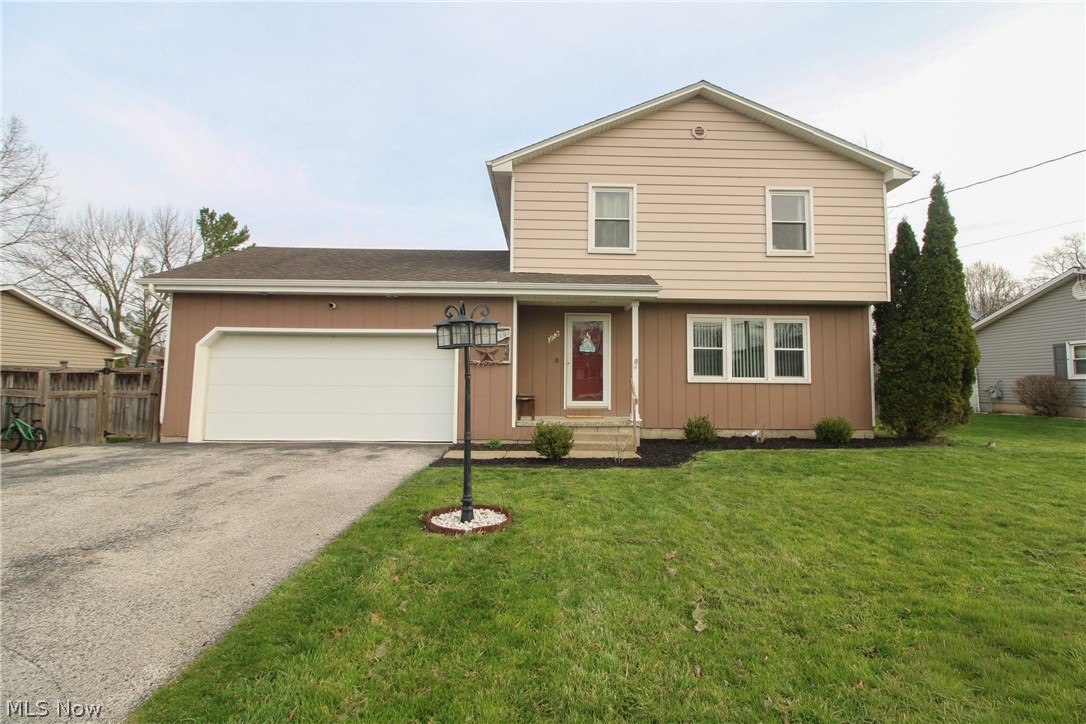 Looking for a great new home that sits tucked on a dead end street? One with a great privacy fenced yard, above ground pool and wonderful deck to relax and enjoy the warmer summer months on the horizon? This one is priced to grab your attention and offers quite a lot! Weathersfield Schools! The driveway is triple wide offering so much room for visitors. Covered front porch entry leads into a spacious living room. Modern flooring. A kitchen remodel from top to bottom, modern, and completed a few years ago, the kitchen island is definitely a large bonus! The appliances stay! Oversized sunken family room with a stone wall fireplace and glass slider doors leading to the private backyard. Modern Half bath completes this level. Leading upstairs, the wood staircase brings you to 3 large bedrooms with ample closet space as well as an updated full bath.  The basement is currently used as a fourth bedroom and while not professionally finished this space has been waterproofed and there are newer glass block windows. Divided, the second half of the basement holds the utilities, sump pump and the laundry area, washer and dryer stays as well for the new owner. One thing is evident, there is HUGE potential for finishing of this space! It’s a blank slate for possibilities! Moving outside, outside you will love your private fenced in backyard, we hope you can see the years of enjoyment that can be had on this newer multi tier deck, above ground pool, covered patio off the back of the garage, and all the entertaining space you need. Shed to stay as well for the new owner so there is plenty of room to store fun items for your new pool and also your lawn necessities. The attached garage has auto door opener and extra space for storage as well. Set your appointment and let’s see if this is your new address! Call today!