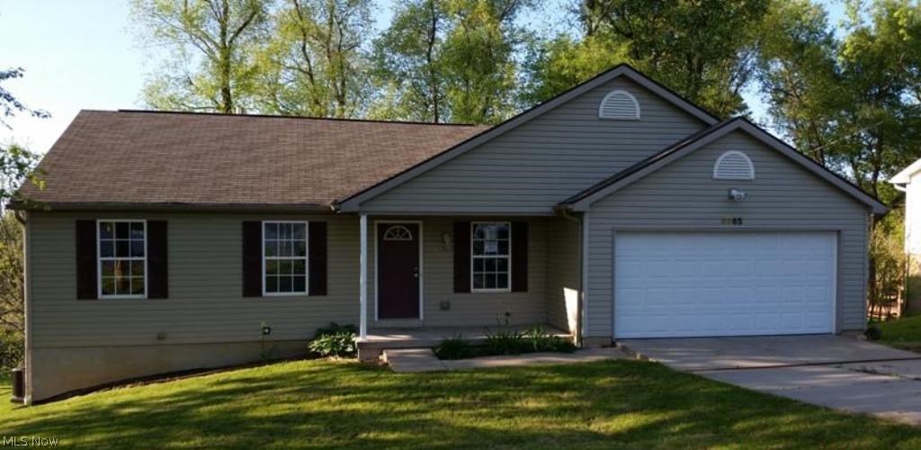 Lovely 3 bedroom, 2 bath ranch on large terraced, wooded lot.  Raised deck in back offers lovely wooded view.  Full walkout basement, first floor laundry and 2 car attached garage are features in this one floor living home. To be sold AS IS. Buyer responsible for due diligence inquiry of all property information. Closing agent of Buyers choice.  FHA Financing subject to FHA Appraisal (IE - Insured Escrow)