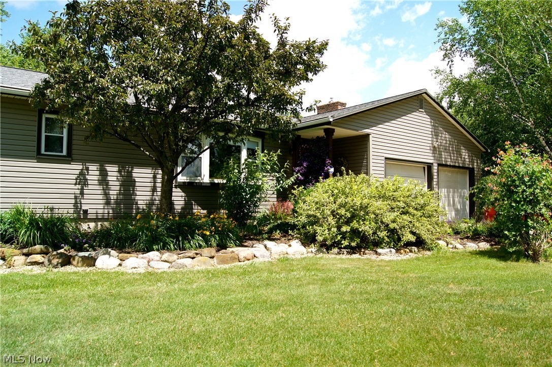 This ranch home in Seville is ready to move in. Beautiful back yard out of magazine! 3 bedrooms 2 bath. Huge rec. room in basement. Close to Medina but country living. Building in back is 16x24 with loft. Shed 8x12 also.Big open frame Porch 6x24. Pool table does not stay.New furnace,new carpets & pellet stove. Deck is 10x15.