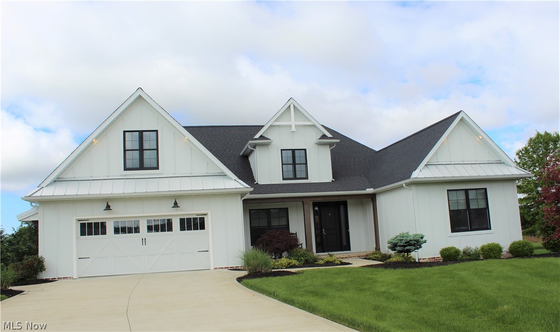 Welcome to 2374 Deer Creek Circle, a custom-built modern farmhouse by Zollinger Builders, originally featured in the 2017 Wayne & Holmes County Home Builders Association Parade of Homes. Situated on nearly half an acre at the end of a quiet cul-de-sac, this exceptional ranch home offers over 2,900 square feet of finished living space with 4 bedrooms, 3.5 bathrooms, and thoughtful custom details throughout.

From the moment you enter, you'll appreciate the craftsmanship, including 9-foot ceilings, coffered and beamed ceiling details, brick accents, built-in cabinetry, and abundant natural light through Andersen windows with premium custom blinds. The heart of the home is the beautifully designed kitchen featuring a one-of-a-kind custom island with an attached dining table that extends to comfortably seat up to nine—perfect for everyday living and entertaining alike.

The spacious sunroom features a vaulted ceiling and cozy gas fireplace, creating the perfect place to relax year-round. The private primary suite includes a generous walk-in closet with direct access to the laundry room and a luxurious en-suite bath. Two additional main-level bedrooms each offer walk-in closets and share a convenient Jack-and-Jill bathroom. A dedicated office provides an ideal work-from-home space.

The partially finished walk-out basement expands the home's versatility with a large fourth bedroom and full bathroom, offering excellent space for guests, or recreation, while still leaving ample storage or room for future expansion.

Outside, enjoy the covered rear deck overlooking the fenced backyard, ideal for relaxing. Additional highlights include a heated garage, quality finishes throughout, and an unbeatable location in one of Orrville's neighborhoods. This truly one-of-a-kind custom home combines timeless style, exceptional functionality, and Parade of Homes quality in every detail.