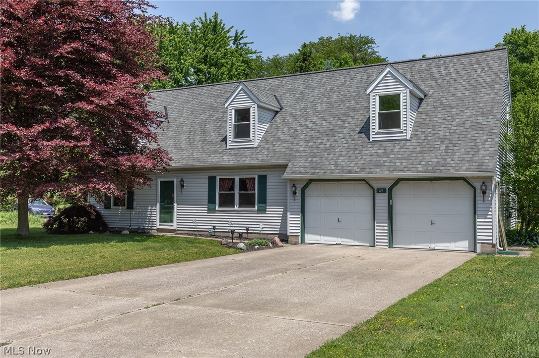 Beautiful Cape Cod on a quiet cul-de-sac street in Painesville Twp. This beautiful 1990 built home is situated on a beautiful lot with a private rear yard. Upon entering the home, you will step into the spacious living room that opens to a large eat-in kitchen. Most appliances are included with your purchase. The main floor has a great mud room / laundry room on the first floor leading to the two car attached garage. There is a main floor bedroom and full bath that can double as a master if needed. Upstairs are three large bedrooms, ample storage and another full bath. The master bedroom is HUGE with a wall of closets. Many updates have been completed including: Roof (3 years), Windows (2-5 years), HWT (5 years), Appliances (7 years), Furnace (13 years). AC (7 years), Patio Slider (6 years). All the big stuff is newer so you can focus on making this home your own!