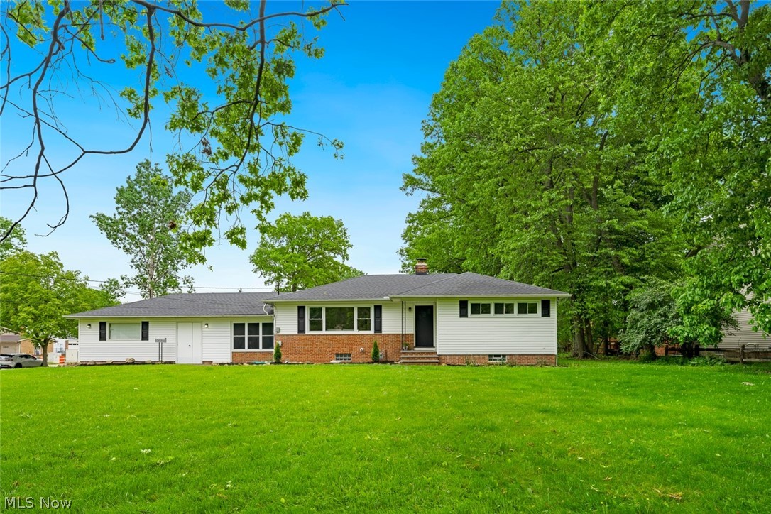 Welcome to this charming 3 bedroom, 2.5 bath mid-century modern ranch on a large corner lot (Canterbury Road and Byron Drive).  This home offers the perfect blend of modern convenience and classic comfort. Home has been completely remodeled and updated throughout.  The living room and dining room flow into the updated kitchen featuring white Shaker style cabinetry with quartz countertops and subway tile backsplash. All stainless steel appliances (2022) stay. Beautiful original hardwood floors throughout the living room, dining room, hallway and bedrooms. The basement (waterproofed 2022) has a large recreation room with new carpet on one half while the other side features laundry, utility, and storage spaces with a full bath. Located between the garage and the kitchen entrance is a large wood paneled breezeway ideal for sitting and relaxing.  New roof 2023 (complete tear off and rebuild), exterior waterproofed (2022) with sump pump installed, all outlets replaced 2022, air ducts cleaned 2025, new basement utility sink 2025, windows replaced 2022 by prior owner.  All the big ticket items have been taken care with nothing left to do but move in! Call and schedule your showing today.