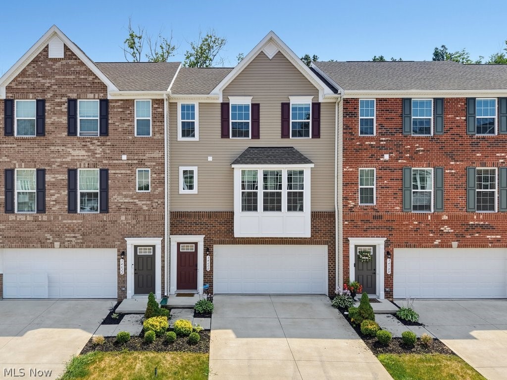 Welcome to this stunning townhouse in Brookwood Crossing, built in 2022 and better than new! Thoughtfully upgraded throughout, this move-in-ready home offers modern finishes, functional living spaces, and a private wooded backdrop.

The main level features a bright, open-concept floor plan designed for both everyday living and effortless entertaining. The spacious living room flows seamlessly into the beautifully appointed kitchen and dining area, where sliding glass doors lead to a newer composite deck overlooking peaceful woods and offering a relaxing view of the stream below. It is an ideal setting for morning coffee, evening relaxation, or hosting family and friends.

Upstairs, you'll find a luxurious owner's suite complete with a walk-in closet and a private en-suite bath. Two additional generously sized bedrooms offer ample closet space, while the conveniently located second-floor laundry makes everyday chores a breeze.

The versatile first-floor flex room provides endless possibilities as a home office, fitness room, playroom, or additional living space. It also offers direct access to the attached two-car garage and a glass door leading to the backyard.

With stylish upgrades, flexible living space, scenic wooded and stream views, and a desirable location, this exceptional home truly has it all. Don't miss your opportunity to make it yours!