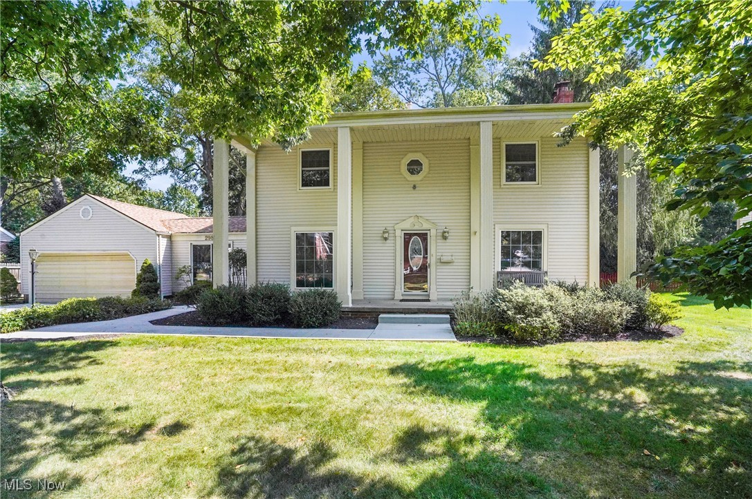 This grand Southern Colonial  situated in Silver Lake Estates is truly a pleasant surprise. The impressive 37 ft wide front porch with 2 story high columns creates instant curb appeal and charm. At first glance into the formal living room with fireplace and the formal dining room or den, you will find generous sized rooms that are expansive and open and filled with natural light. The gleaming hardwood floors are beautiful throughout. The eat in kitchen with an extra dining area or den  is huge and it has two sliders that lead to a nice outdoor patio and the large backyard that is fenced and semi private. The first floor also includes a bonus room, a full bath, a first floor laundry and an enclosed breezeway that opens to the two  car garage. Upstairs you'll find that years ago this home was expanded at one time with an addition making it a 6 bedroom, 3 full bath home. The basement has a rec room with a second fireplace and separate unfinished side. The oversized concrete drive allows for plenty of parking. Updates since '07  include 2 furnaces, the roof and concrete surfaces. Located in close proximity to the schools and to the Silver Lake boathouse, beach and picnic area where residents enjoy swimming, boating and fishing privileges. There's also a lovely park area behind Silver Lake City Hall that is adjacent to the Cuyahoga River and offers a kayak/canoe launch, picnic shelter, baseball field, playground, tennis and basketball courts and the hike and bike trail! Contact me today to see this lovely home and community!
