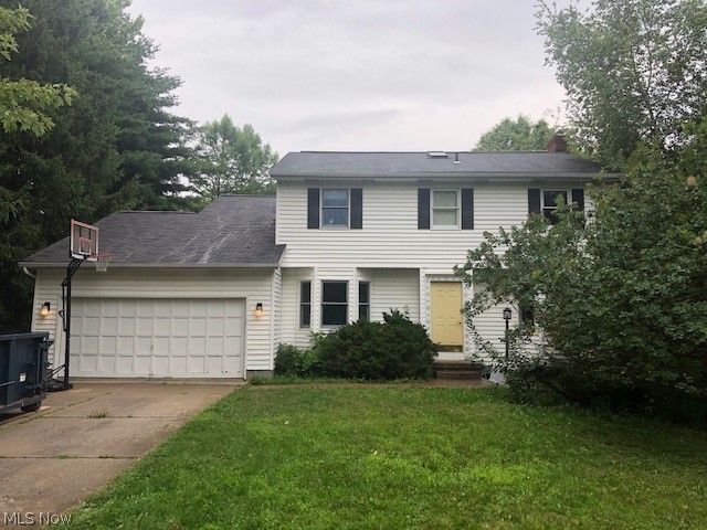 Great location and tons of potential just minutes from shopping and historic downtown.   First floor has hardwood floors, formal living & dining room, family room with fireplace, kitchen with granite counters, first floor laundry, half bath and three season porch.   Three bedrooms and 2 full baths on 2nd floor, a nice master suite with attached office or nursery room.   The large basement is a walk out.   The large lot is awesome.   Age of mechanical systems unknown.  House does need some work which reflects in the price.