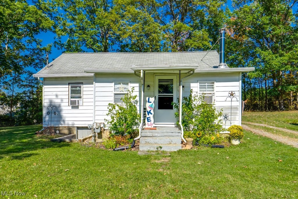 Beautifully updated ranch home in the heart of Lake Milton offering easy single-floor living on a generously sized lot. This move-in ready home features 2 bedrooms, 1 full bath, main-floor laundry, and thoughtful updates throughout, blending modern comfort with everyday functionality. The second bedroom is currently being used as additional living space, offering flexibility to fit your needs. The oversized detached garage provides plenty of room for vehicles, hobbies, or workshop space, while the large storage barn offers even more flexibility for storage or recreational equipment. Conveniently located near Lake Milton State Park, enjoy easy access to boating, fishing, swimming, walking and biking trails, golf, wineries, restaurants, and entertainment all with quick interstate access for an easy commute or weekend getaway.
