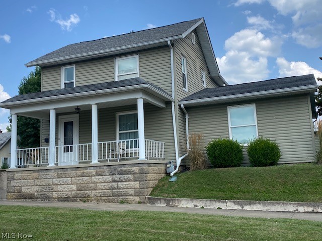 Well-Kept two story located in charming downtown McConnelsville on Corner Lot! Fabulous older home with first floor laundry, bedroom and bath. Home features large eat-in kitchen with adjoining formal dining room and living room, lots of original woodwork, upstairs are 2 more bedrooms and another full bath. Covered carport on side, nice patio in back with an outbuilding for extra storage. Covered front porch that overlooks town.