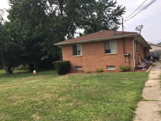 Great Ellet duplex!  Brick home with a shared, attached garage in between the units.  Each side has a living room, eat-in kitchen, full bath, 2 bedrooms and a full basement.  On one side there is a second 3 piece bath in the basement.  Harwood floors in both units.  Right side water heater 1 year old.  Empty corner lot behind property adds additional privacy.  Both units occupied.
2519 room dimensions
living room 17x11
kitchen  14x8
bedroom  12x10
bedroom  12x9
2521 room dimensions
living room 15x11
kitchen  15x11
bedroom 11x9
bedroom 11x8