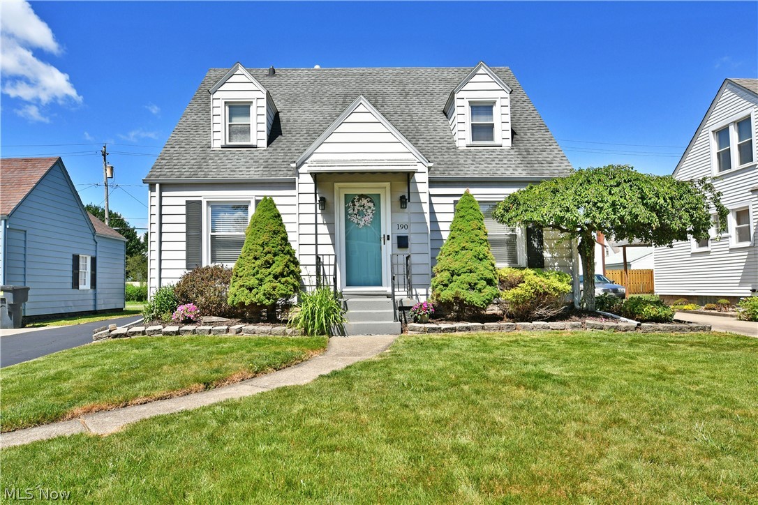 Find style, convenience, and comfort in this charming Warren Cape Cod! Lovingly maintained and updated throughout, this home offers everything you have been looking for in turnkey living. An instant standout with its manicured landscaping and stone-lined mulch beds, the property continues to impress with a freshly sealed driveway, detached one-car garage, and a must-see fenced backyard featuring the perfect deck for warm summer days and relaxing evenings. A large storage shed adds even more functionality. Inside, a decorative front door opens to a vestibule-style foyer, providing added security and a welcoming transition. The spacious living room showcases attractive ash-colored flooring, abundant natural light, and a beautiful decorative fireplace that serves as a focal point of the space. Two first-floor bedrooms are accompanied by a stunning full bath featuring a beautifully tiled shower with a glass block accent. The rear bedroom offers convenient access to the backyard deck, while the spacious front bedroom provides excellent closet space. At the heart of the home, the formal dining area sits just outside the beautifully appointed kitchen, complete with rustic accent walls, cherry-toned cabinetry, and attractive stone-look flooring and backsplash. Upstairs, a versatile loft area makes an ideal home office, reading nook, or flex space. The oversized primary suite offers a generous footprint along with its own private half bath and ample closet space. Downstairs, the basement provides rec space, laundry services, ample storage, and a second full bath. Additional features and updates: all kitchen appliances stay, vinyl replacement windows, air conditioning 2023, glass block windows 2018, main electrical box 2018, and so much more! Plus a one-year home warranty!