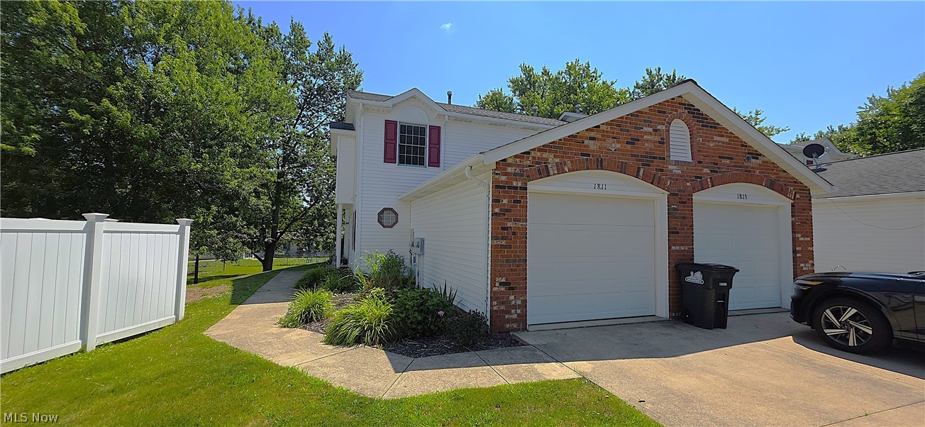 Move-in ready end-unit townhome ideally situated on a quiet cul-de-sac! This charming 2-bedroom, 1.5-bath home features newer carpet, luxury vinyl plank flooring, and a spacious living room perfect for relaxing or entertaining. The kitchen offers a breakfast bar, large dining area, and all appliances are included. A convenient first-floor laundry adds to the home's functionality. Upstairs you'll find two generously sized bedrooms with excellent closet space and a full bath. Step outside from the living room to your private patio, perfect for enjoying your morning coffee or relaxing outdoors. An attached garage with direct access into the unit provides added convenience, along with plenty of storage throughout. Located within a short distance to shopping, restaurants, and everyday amenities, this home offers a fantastic combination of comfort, convenience, and low-maintenance living. Great location—schedule your showing today!