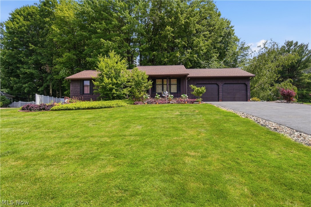Welcome to this wonderful ranch home nestled on a quiet cul-de-sac in Lake Township within the Lake Local School District. Surrounded by mature landscaping and a private setting, this home offers exceptional outdoor living space perfect for relaxing or entertaining. With over 2,600 sq ft of finished living space, including a spacious lower-level recreation area, the home features 3 bedrooms and 3 full bathrooms. The main level is filled with natural light and offers an open floor plan designed for comfortable everyday living. A convenient first-floor laundry room adds to the home's functionality. Rich in timeless character and classic design, this home is ready for your personal touches to make it your own. Additional highlights include a 2-car attached garage and a 10' x 8' storage shed. Ideally located near schools, parks, shopping, and dining, this is a fantastic opportunity to own a quality home in an excellent location.