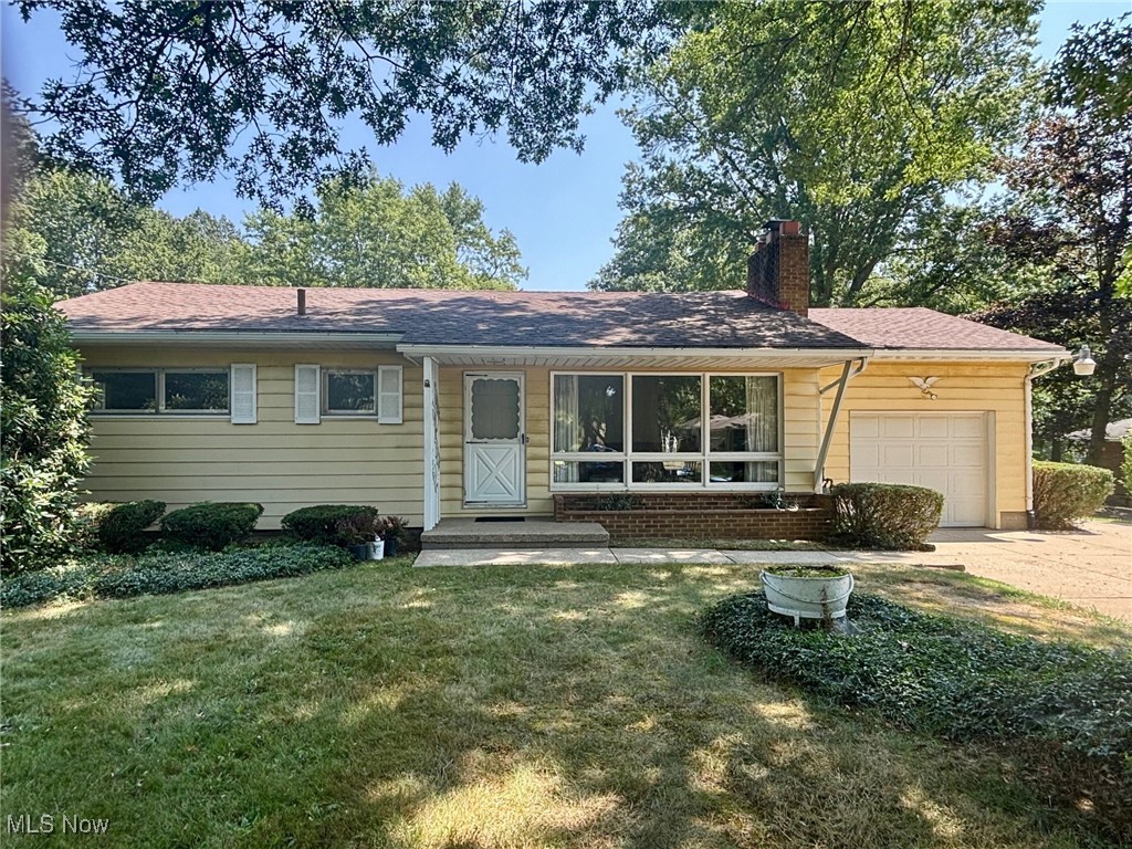 For sale for the first time in 60 years, this well-maintained home in the highly sought-after Green Local School District sits on a spacious 0.68-acre lot and offers both charm and potential. Originally a 3-bedroom, this 2-bedroom, 1-bath ranch now features a dedicated dining room that could easily be converted back if desired. The cozy living room includes a wood-burning fireplace and a large picture window that fills the space with natural light. Original oak hardwood floors lie beneath the carpeting, preserving the home's classic character.

The kitchen offers a functional layout with a clear view of the backyard and patio. All appliances stay. The partially finished basement adds extra living space with a retro vibe—including a pool table—plus a laundry area with washer/dryer and plenty of storage and workshop needs.

In addition to the convenient attached one-car garage, the true highlight is the large 24'x28' detached heated garage—perfect for hobbyists or serious DIYers. It comes equipped with an air compressor, grinder, and drill press.  

The sizable backyard includes a shed and a small fenced-in area, ideal for pets or a protected garden space. Recent updates include: Furnace 2023, Water Heater 2024, Refrigerator 2024, Electric Panel in house and detached garage 2025. PLUS seller is providing a one year home warranty! Lovingly owned for six decades, this property is ready for its next chapter—schedule your showing today!
